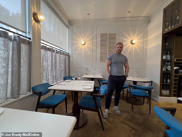 Tasting menus at 104 with top-grade wagyu beef run at £150 - while the priciest bottle of red wine can cost £4,900 (pictured: Mr Wilkins inside his restaurant)