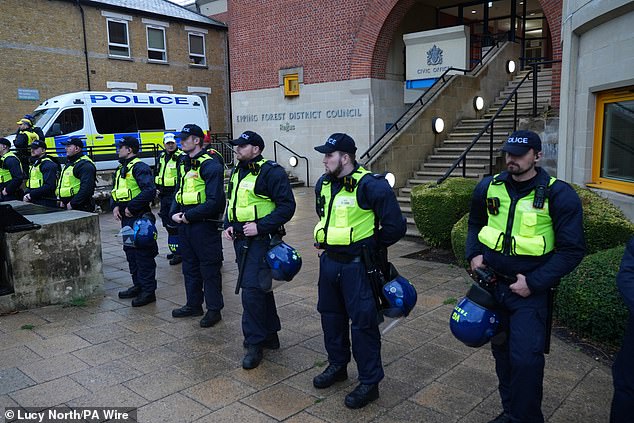 Police stand guard outside Epping Forest District Council offices