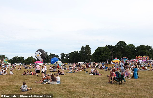 Festival-goers at Balloons and Tunes in Romsey, where some slammed the 'overpriced' and 'disgusting' food and hit out at aspects that were cancelled including fireworks