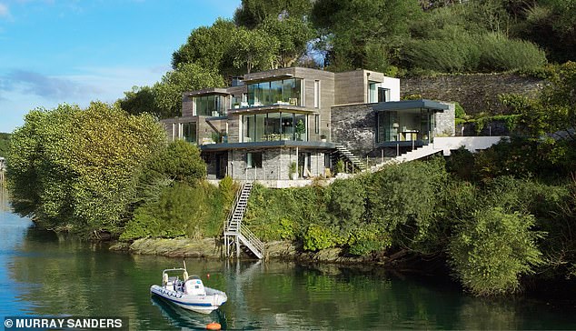 The Fowey-front glass house Omaze raffled. In Cornwall with river views and a private jetty