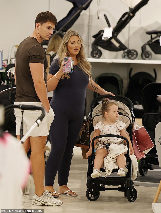 The couple looked at purchasing a pram for their unborn baby during their day out
