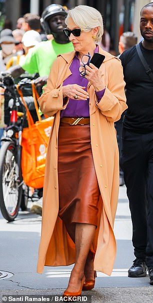 Streep added a pair of chunky gold earrings to further glam up the outfit, as well as a pair of black shades and a ring on her right hand