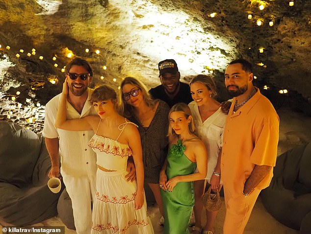 In yet another image, fans spotted Taylor's longtime BFF Ashley Avignone and Este Haim, signaling Travis's growing closeness to Taylor's inner circle of friends