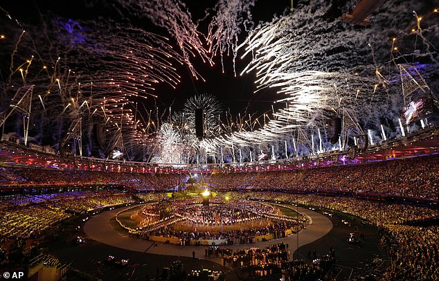 The Olympic cauldron is lit during the opening ceremony at the 2012 Summer Olympics