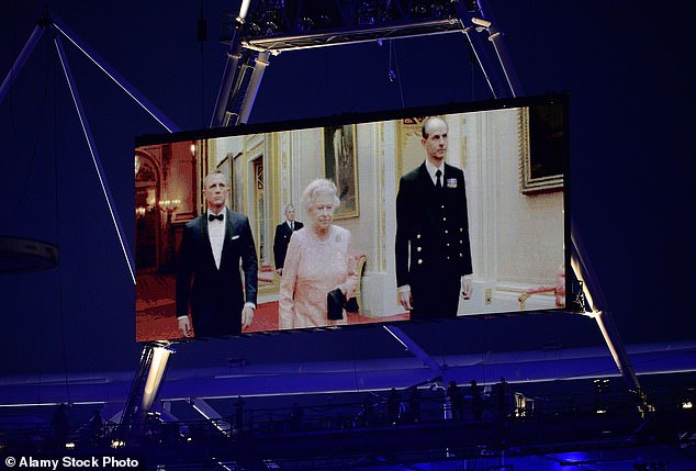 The Queen took spectators by surprise as she appeared on a large video screen during the ceremony