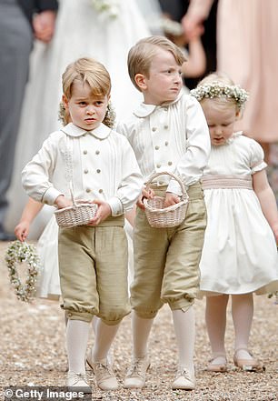 George pictured alongside the flower girls and page boys at Pippa Middleton and James Matthews' wedding in 2017