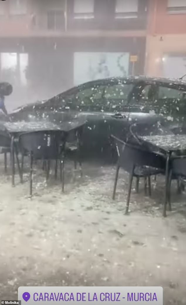 The Murcia region has been badly hit and in the city of Caravaca de la Cruz, a major pilgrimage site, golf-sized hail balls smashed down on cars