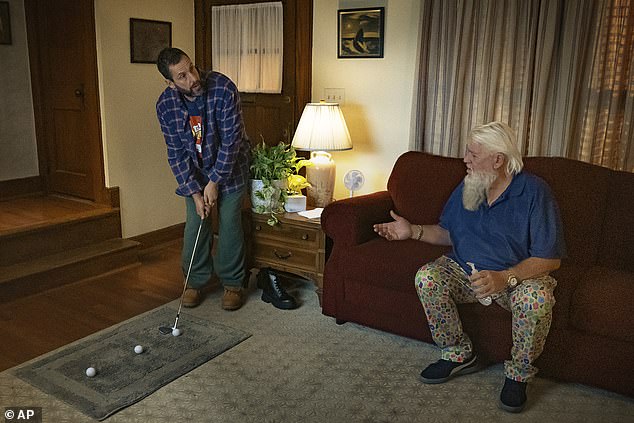 There's also a host of cameos from famous faces including Northern Irish pro golfer Rory McIlroy , musician Bad Bunny , US football star Travis Kelce , the boyfriend of American pop superstar Taylor Swift and Eminem. Pictured, Adam Sandler, left, and John Daly in a scene from Happy Gilmore 2