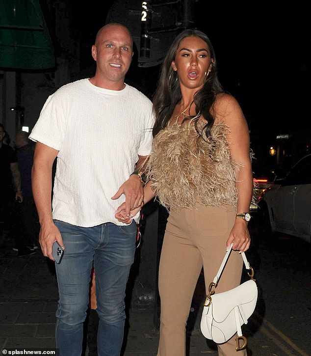 In 2022, Evans went on a string of dates with The Only Way is Essex Star Hannah Voyan. The couple (pictured) were seen publicly holding hands while leaving a restaurant in Mayfair, London, alongside other Towie co-stars including Chloe Brockett