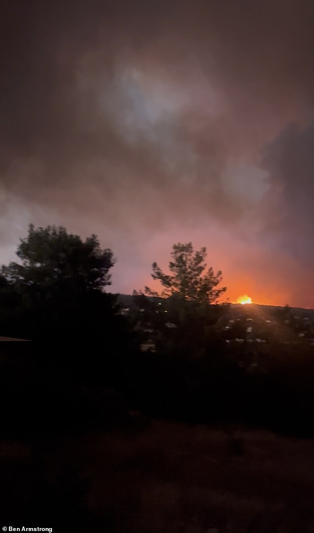 Ben and Lucy took pictures and videos as they sped away from the raging fire