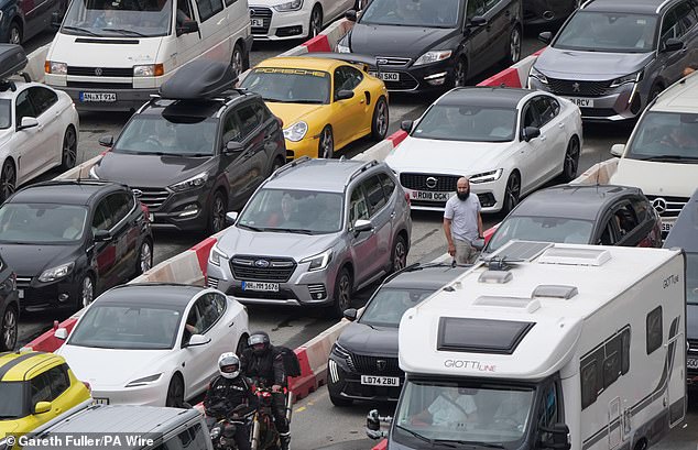 Holiday and freight traffic queues to use the Port of Dover in Kent this morning