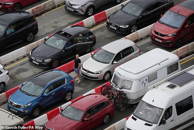 Holiday and freight traffic queues to use the Port of Dover in Kent this morning