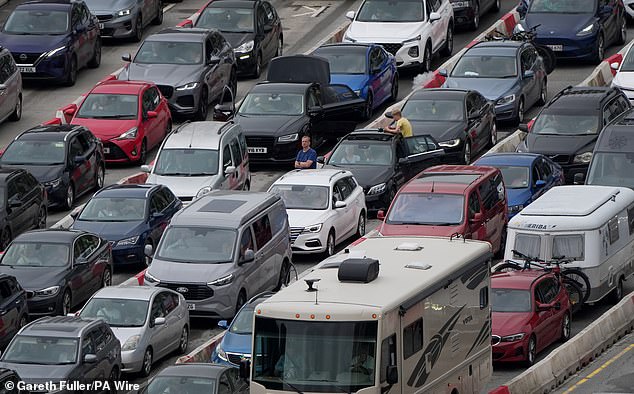 Holiday and freight traffic queues to use the Port of Dover in Kent this morning