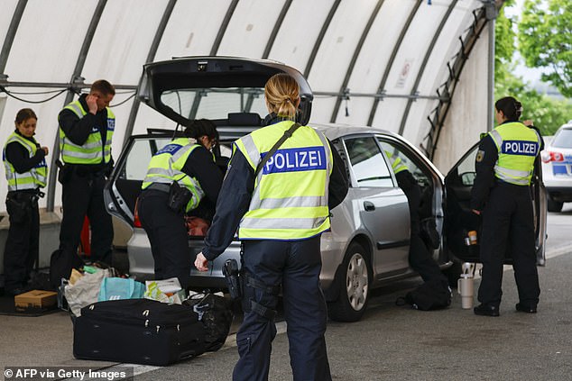 The German federal police controls vehicles coming into Germany from Austria at the border control station Kiefersfelden, southern Germany, on May 9, 2025