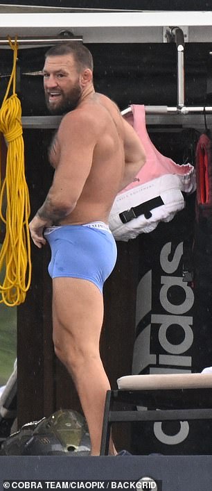 The Irish MMA fighter, 37, has been embroiled in controversy after being photographed kissing a mystery brunette woman on a beach in Fort Lauderdale