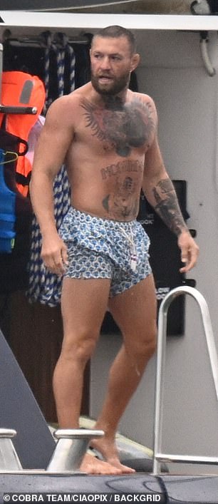 The Irish MMA fighter, 37, has been embroiled in controversy after being photographed kissing a mystery brunette woman on a beach in Fort Lauderdale
