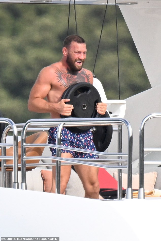 Conor appeared to be keeping fit on his holidays as he was seen using gym equipment before diving into the sea