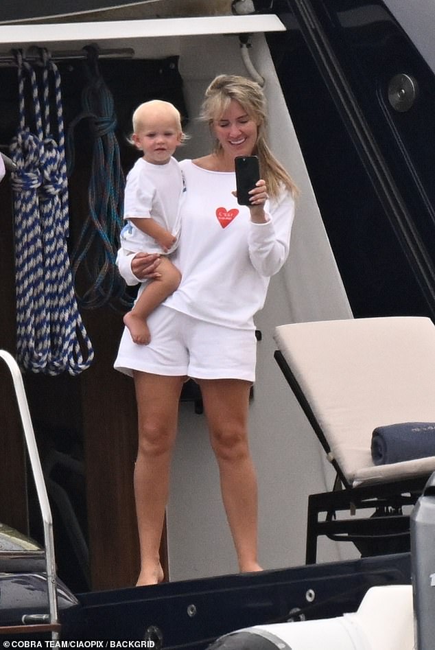 She later covered up with a white sweatshirt