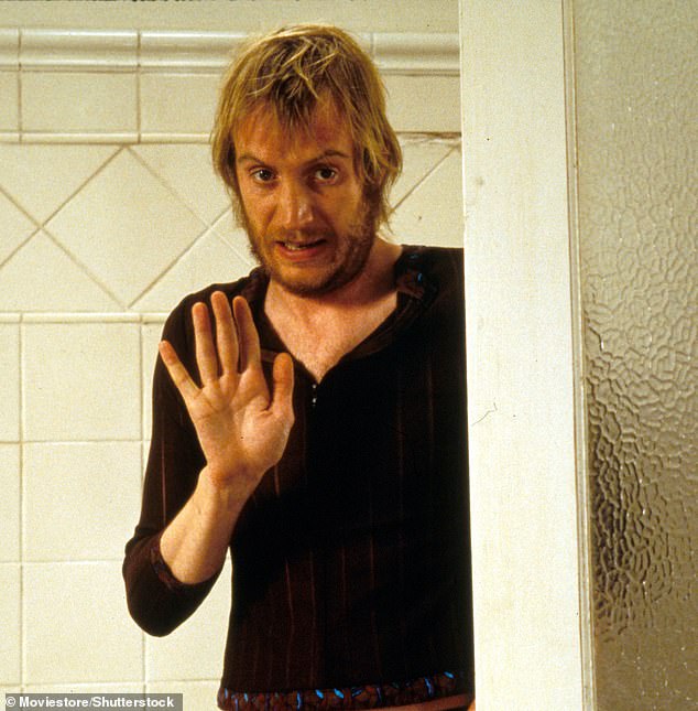It's none other than Rhys Ifans, who played the iconic role of Spike (Pictured) in the 1999 film Notting Hill alongside Hugh Grant and Julia Roberts