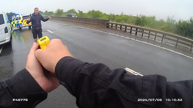 Dramatic police bodycam footage showed Creak getting out of his van as an officer pointed a taser towards him