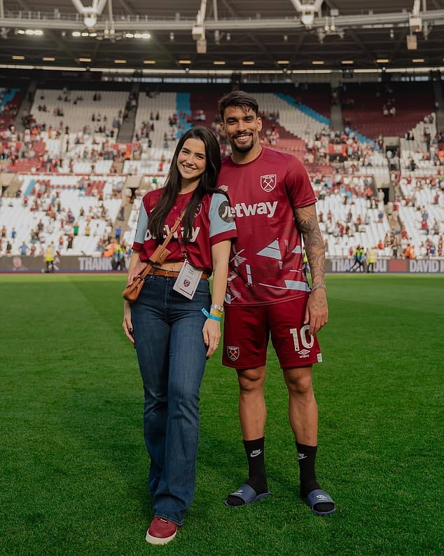Paqueta pictured at West Ham's London Stadium with his wife Maria Fournier, who admitted the couple have been 'living this nightmare for two years' in an emotional statement in May