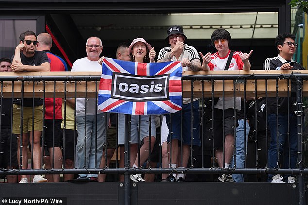 Oasis fans gathered at Boxpark, Wembley, near to the stadium ahead of the first night of the London gigs
