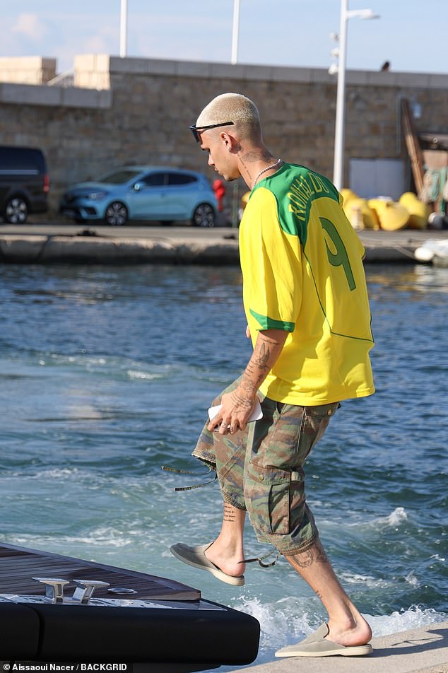 Romeo seen boarding a yacht