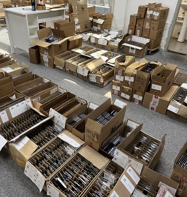 Boxes of potentially stolen phones at the address in 1 Hung To Road, where multiple stolen devices have been tracked to