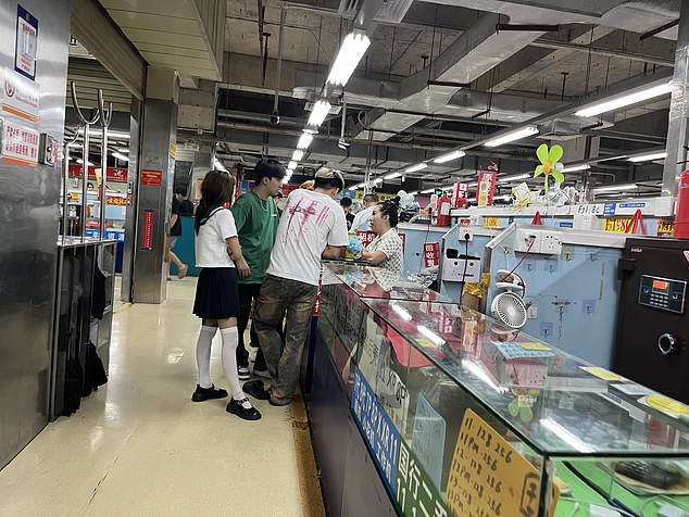 Inside a shopping mall in China where numerous vendors sell cheap second-hand phones