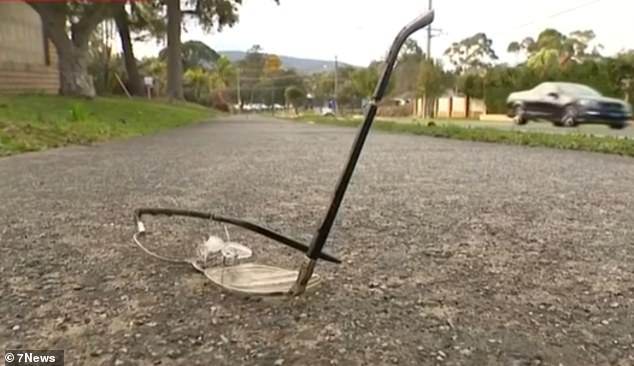 A pair of smashed glasses are pictured at the scene of the fatal crash