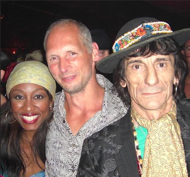 Hersborg, described as 'one of London's most prolific voyeurs', pictured with musicians Ronnie Wood and Beverley Knight