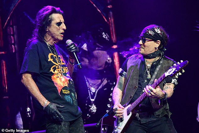 Cooper screamed at the crowd 'Let's hear it for Ozzy!', before belting out some hits