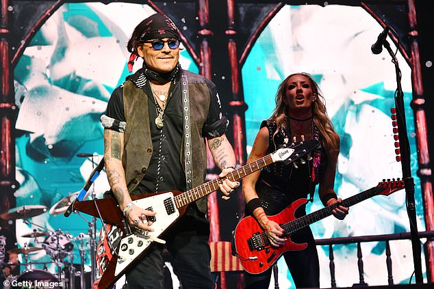Depp made a surprise appearance for the heartbreaking tribute, rocking out on his guitar to a medley of songs