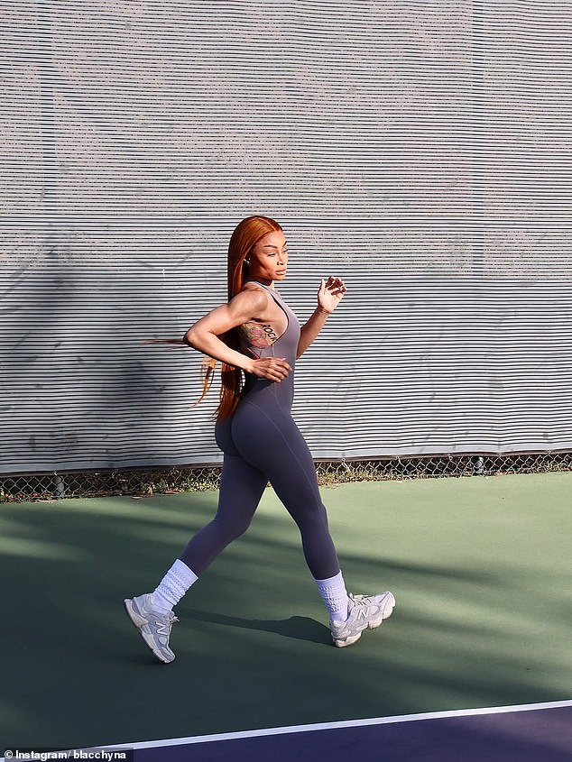 Her sculpted arms were on display as she embarked on a power walk