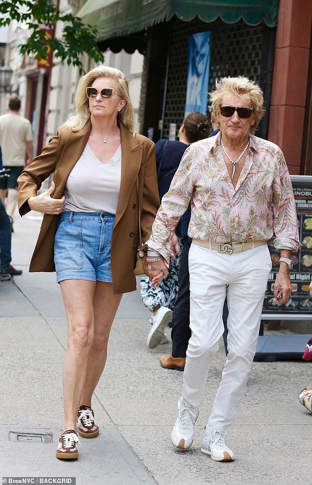 The couple - who have been married for 18 years - were walking through busy Fifth Avenue after having a spot of lunch in the city earlier this week