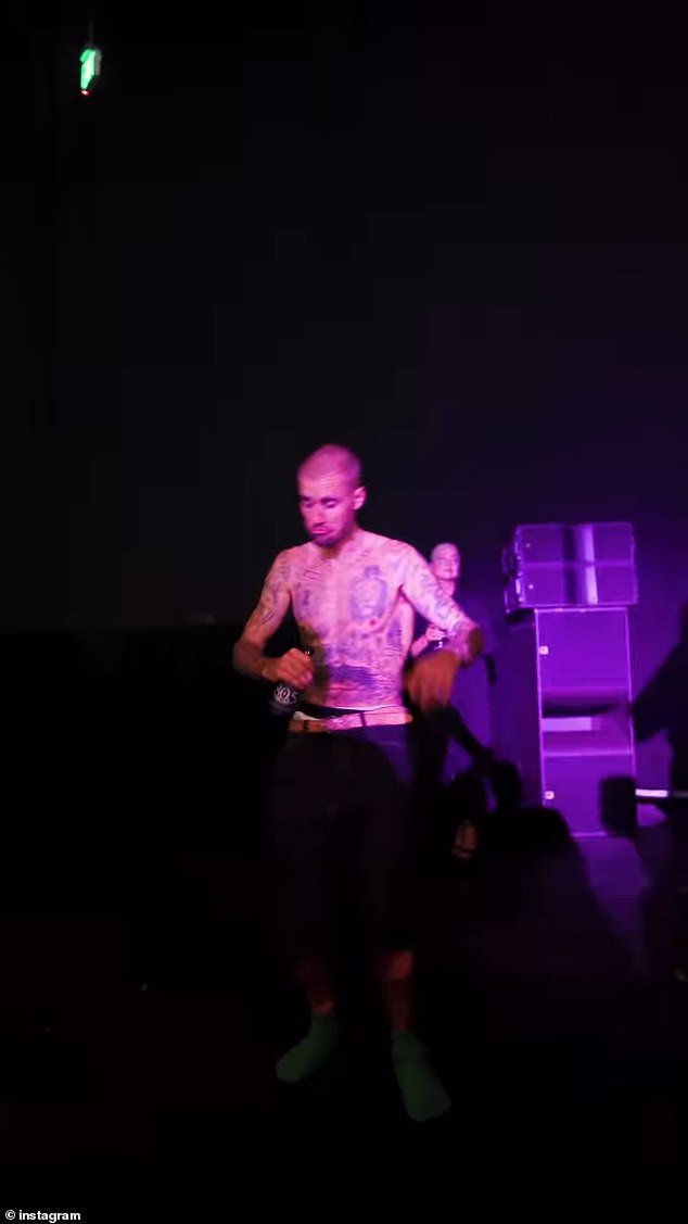 He was spotted roaming through the party with a beer in his hand