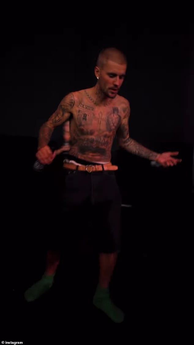Justin also shared a number of images from the event to his Instagram. The singer wore basketball shorts with saggy jean shorts over them