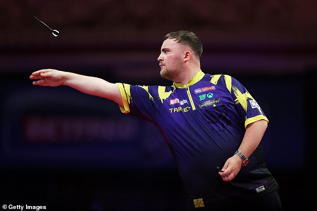The 18-year-old overcame a late surge from Andrew Gilding to triumph 16-14 at the Blackpool Winter Gardens