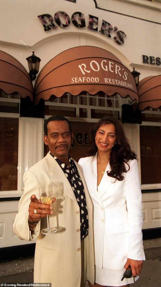 He even bought the restaurant where he used to work and re-opened it as 'Roger's Seafood' (Pictured: Roger and his former assistant Sarm Basram celebrating his 50th birthday outside his restaurant)
