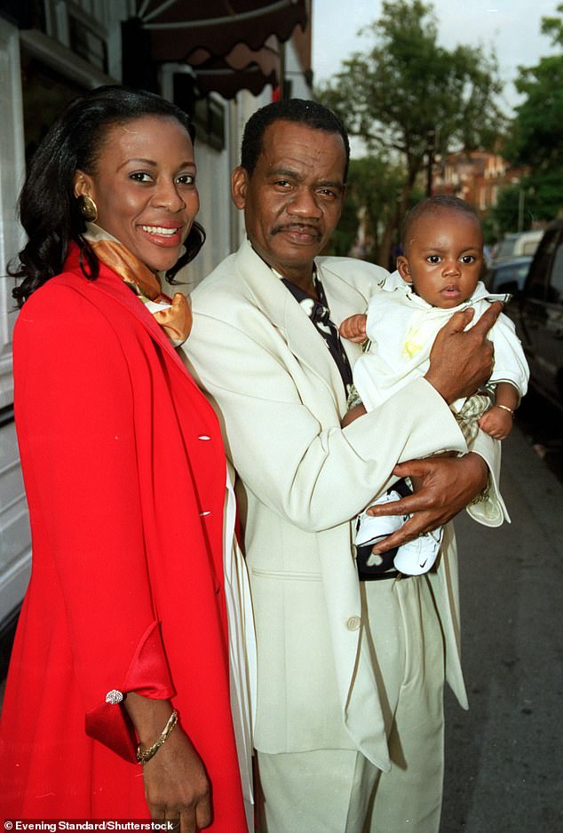 Pictured: Roger, his wife Mary and their son celebrating his 50th birthday outside the restaurant