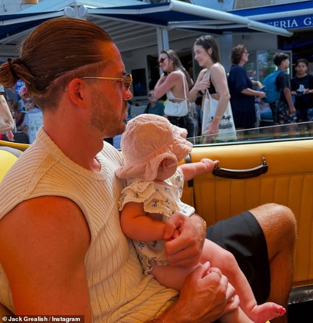 Jack sweetly cradled his baby daughter in his lap in one photograph as they enjoyed a sun-soaked trip. Jack and Sasha welcomed Mila in September