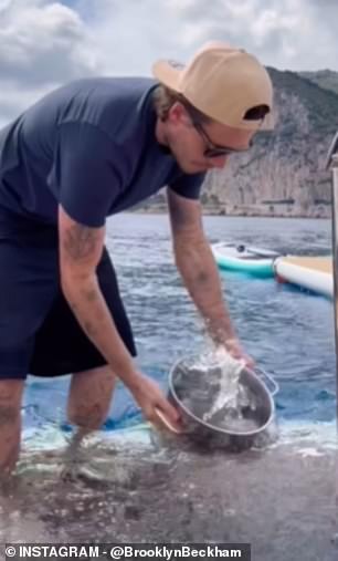 He started by dipping a sauce pan in the sea to fill up his pot from his luxury yacht, before chopping his tomatoes and adding them to an oiled pan