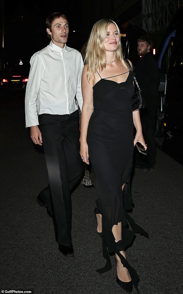She oozed sophistication in a black strapped dress with a side split and completed her look with a pair of pointed heels