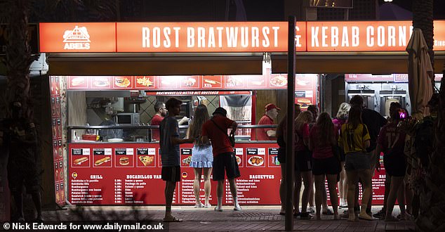 Pictured above: One of many bratwurst shops. Situated just five minutes from the airport, S'Arenal is full of takeaways, souvenir shops and late-night venues catered towards Germans