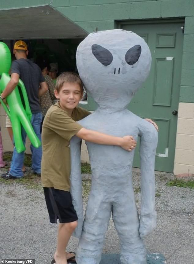 A visitor enjoying a previous Kecksburg UFO Festival in 2012