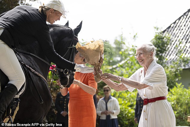 Former monarch Queen Margrethe, 85, stepped in to the role of regent while Frederik and Mary took an extended holiday. She is seen here on July 20 at a royal engagement in Gråsten