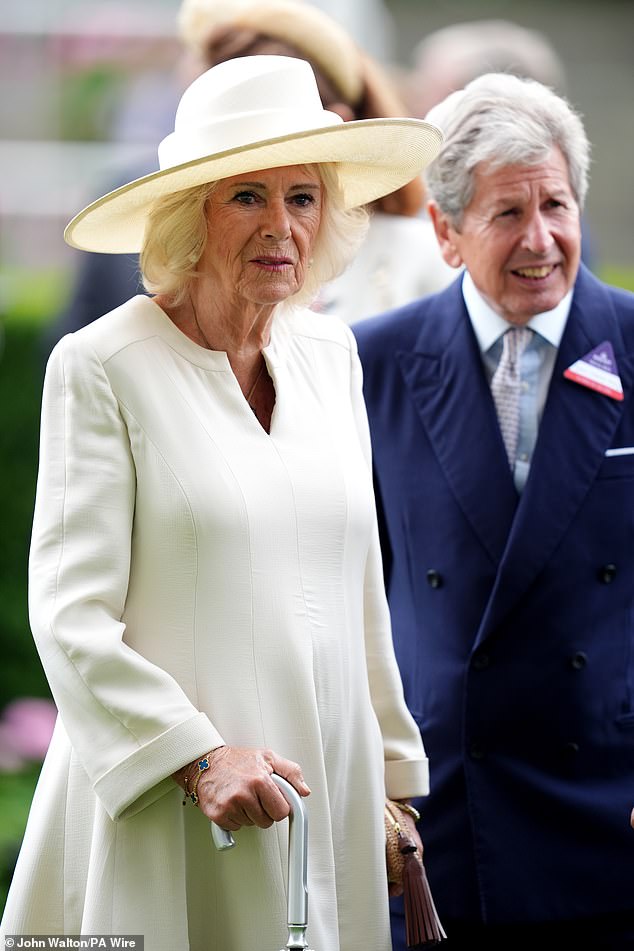Queen Camilla was typically elegant in an off-white ensemble as she arrived at Ascot Racecourse without King Charles this afternoon