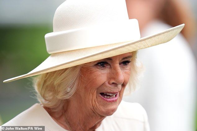 The Queen Consort, 78, was attending the annual King George Racing Weekend in Berkshire - and she more than dressed the part
