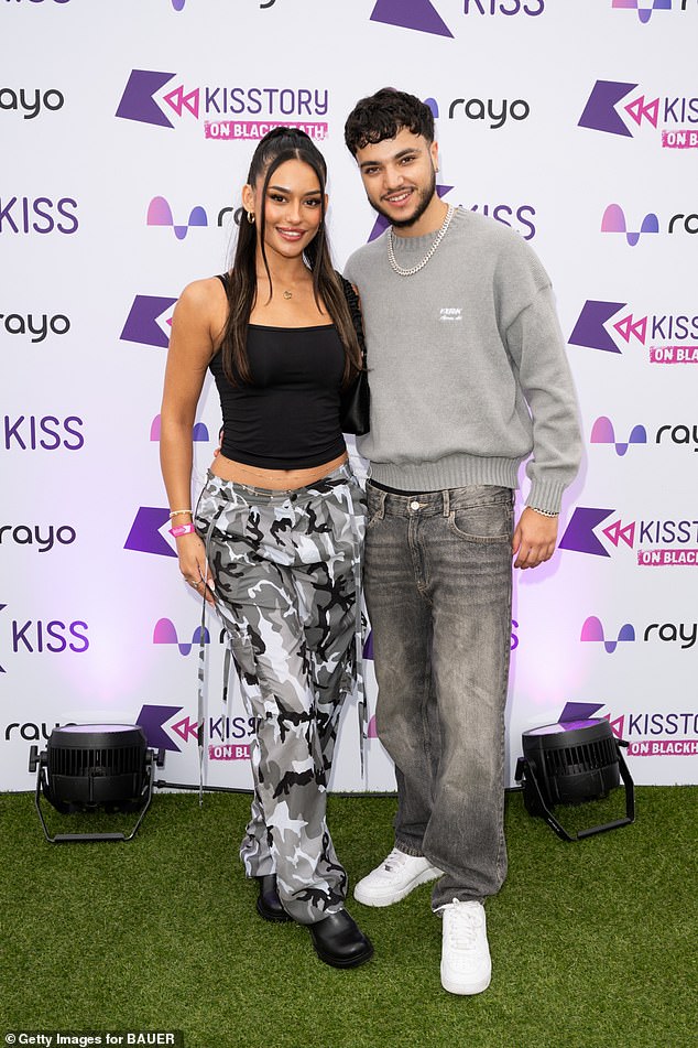 He rocked grey denim and a matching jumper, while Jasmine looked beautiful in a black top and print cargo trousers
