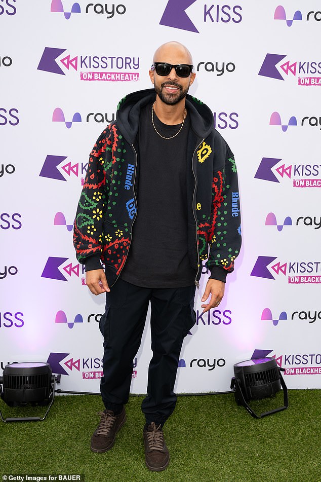 Marvin, 40, gave his wife a run for her money in a multiprint hoodie and a total black ensemble, finishing off with squared shades